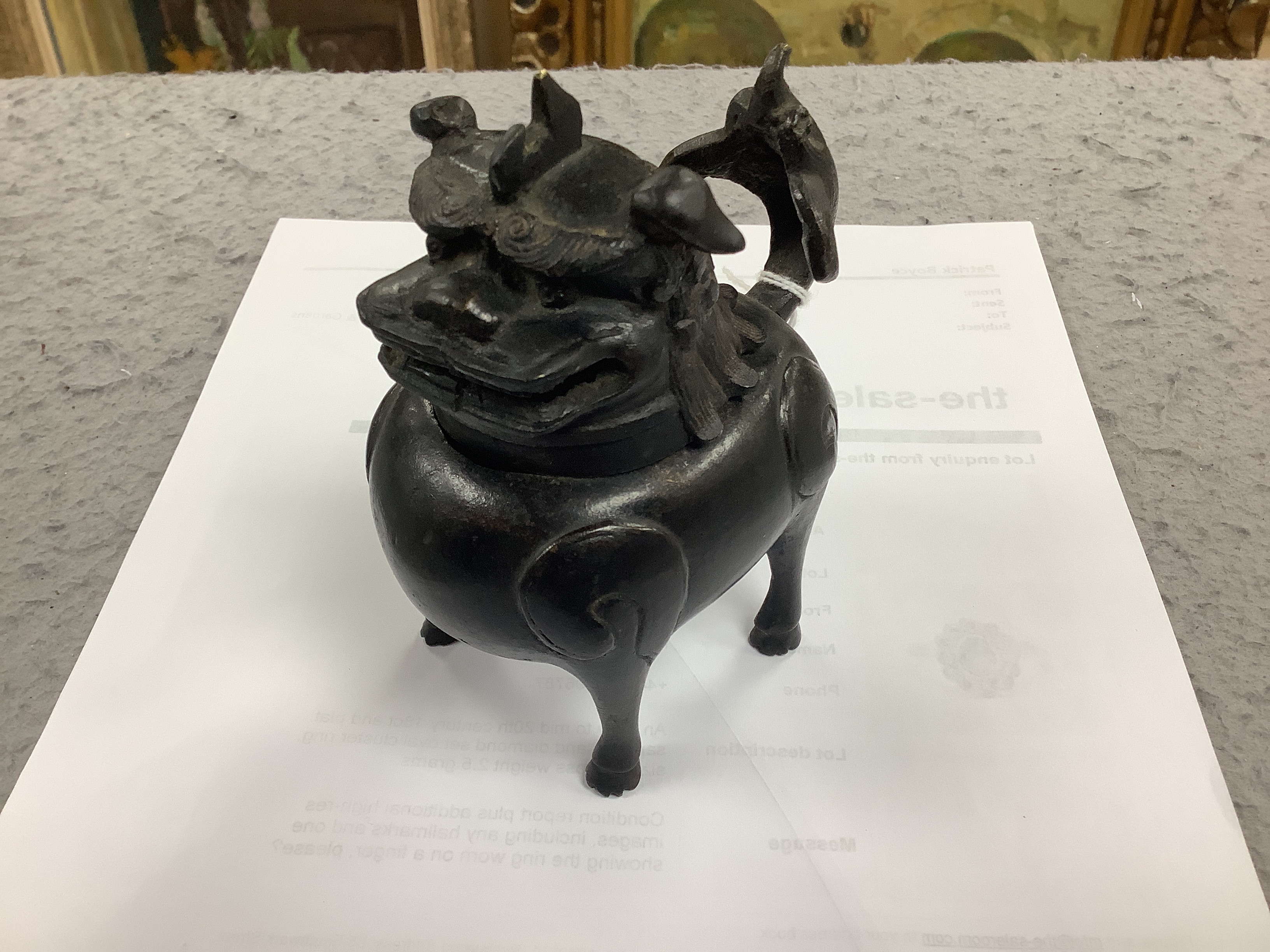 A Chinese bronze mythical beast censer and cover (Luduan), 17th century, the cover with pierced mouth, 9cm in length